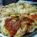 Noche de Pizzerías - La Secta Pizzera 的照片