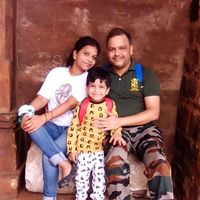Aditya and Nisha with son Ayansh's Photo