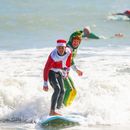 Surfing Santas's picture